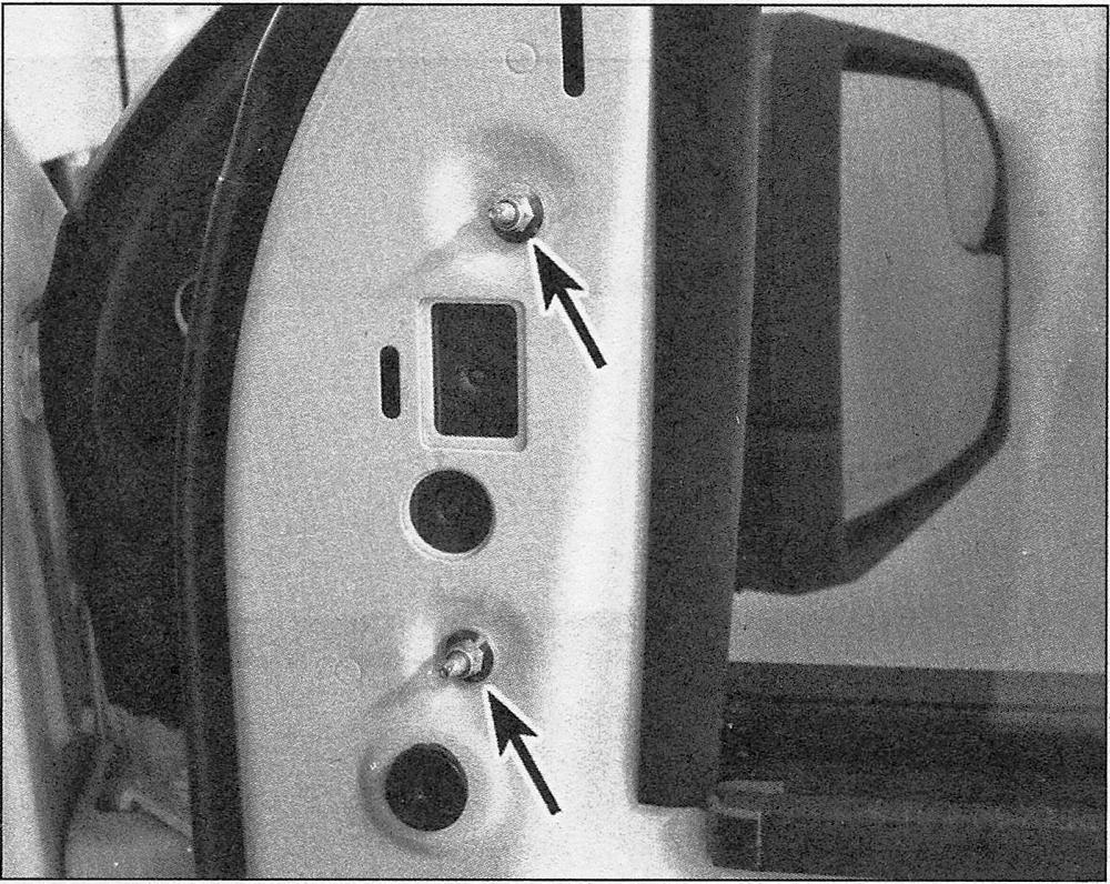 Ford F150 Body_Mirrors - removal and installation _ Remove the mirror retaining fasteners