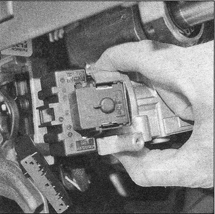 Ford F150 Chassis electrical system_Ignition switch and key lock cylinder - replacement _ Depress the release tabs on top and bottom of the switch, then pull the switch out