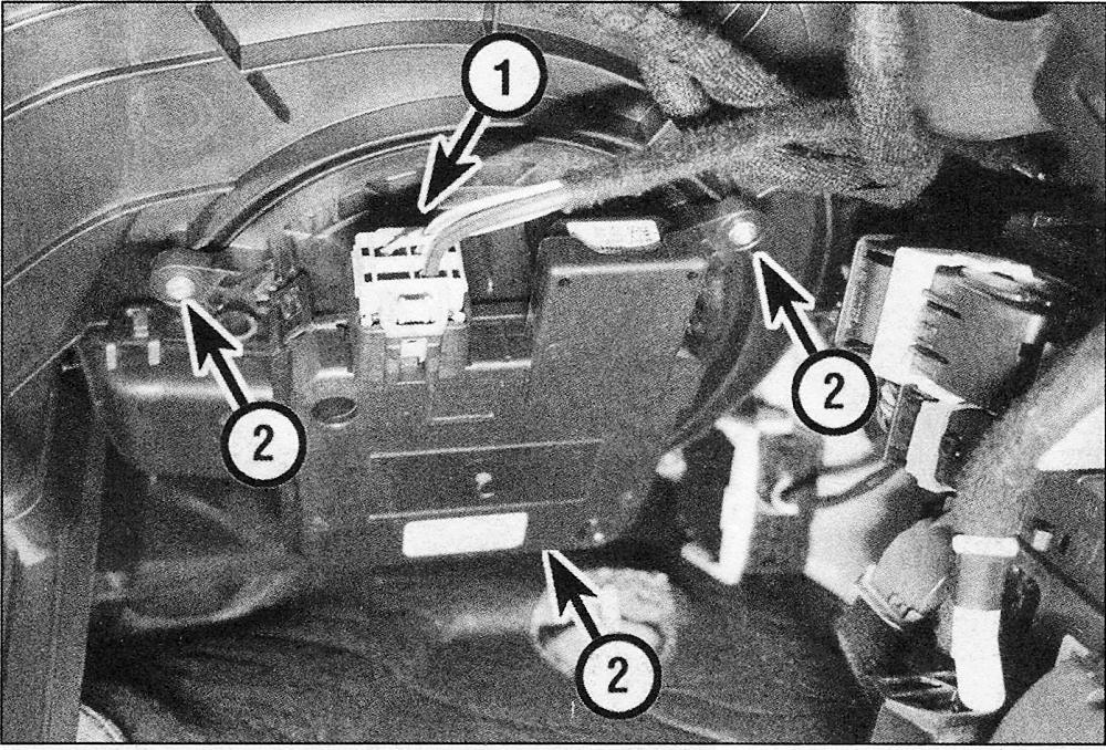 Ford F150 Cooling, heating and air conditioning systems_Air conditioning and heater blower/control module - replacement_Disconnect the electrical connector from the blower motor control module (1), then remove the mounting screws (2)