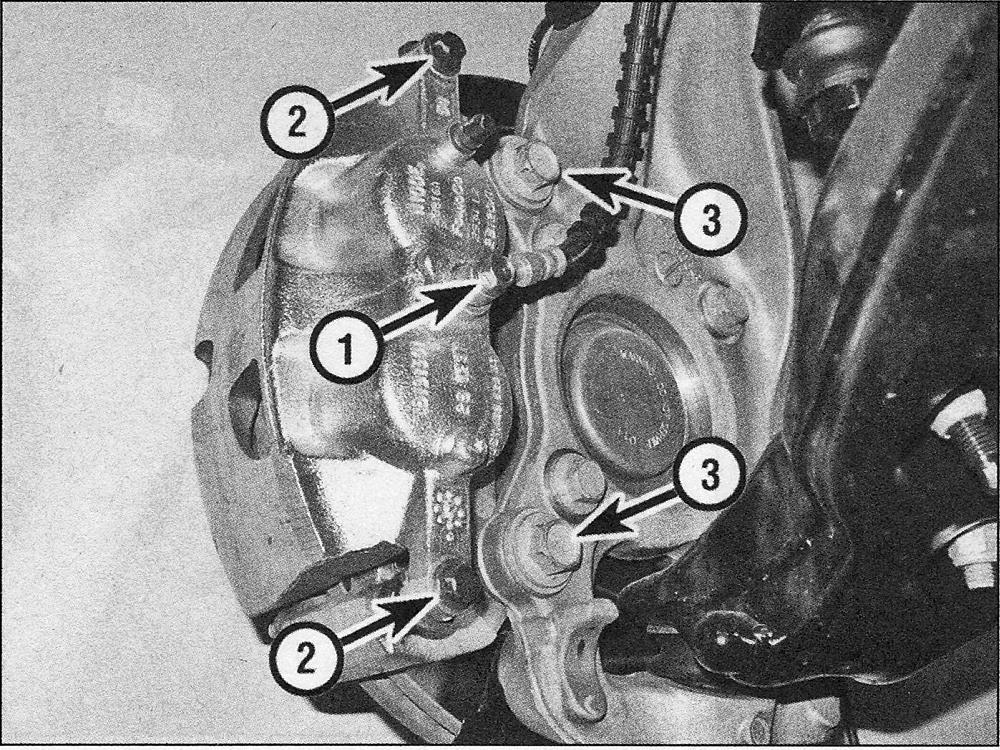 Ford F150 Brakes_Disc brake caliper - removal and installation_ Front caliper mounting details